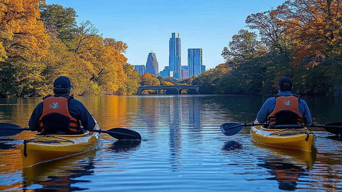 Two people kayaking in Austin's Zilker Park as part of a group activity
